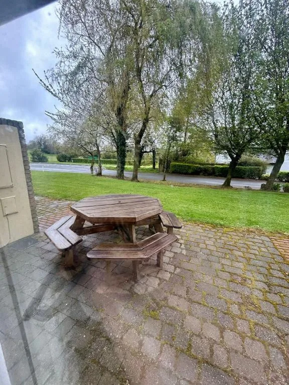 Picnic table on the patio looking onto the golf course